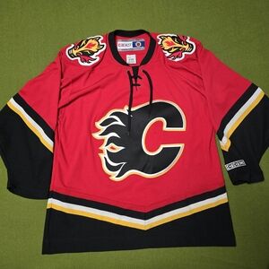 CCM Red and Black Hockey Jersey with Flames Emblem